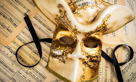 Masquerade mask and sheet music